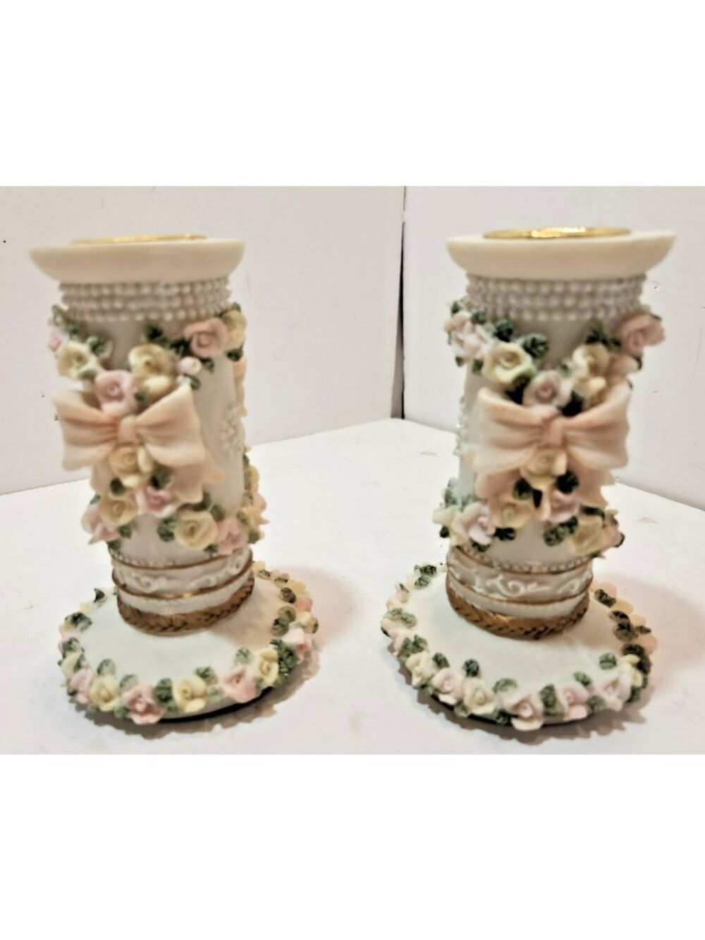 Pair of Sculpted Flower and Bows Ceramic Candlestick Holders Pastels Weddings